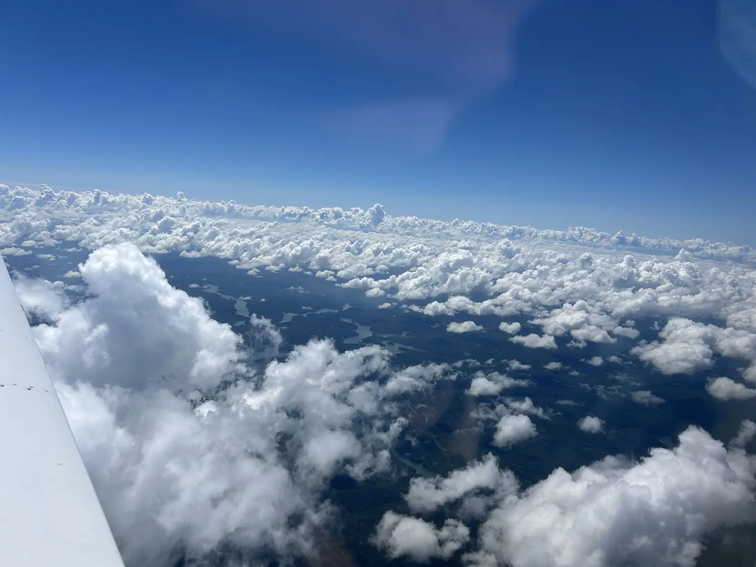 Clouds viewed from a training aircraft during flight training